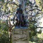 Achievement Bronze statue of Lawson accompanied by a swagman and dog, The Domain, Sydney, designed by George Washington Lambert and unveiled in 1931 of Henry Lawson