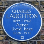 Achievement The blue plaque indicating the birth place of Charles Laughton at 15 Percy Street, Fitzrovia, London W1T 1DU was erected in 1992 by English Heritage. of Charles Laughton