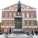 Achievement Anne Whitney, Samuel Adams, bronze and granite statue, 1880, located in front of Faneuil Hall, which was the home of the Boston Town Meeting of Samuel Adams
