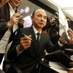 Achievement Malaysian fashion designer Jimmy Choo signs autographs after his workshop at Center Of National Arts on October 23, 2013 in Tashkent, Uzbekistan. of Jimmy Choo