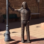 Achievement A life-sized statue of Frey was unveiled at the Standin' on the Corner Park in Winslow, Arizona, on September 24, 2016, to honor his songwriting contributions to "Take It Easy", made famous by the Eagles as their first single in 1972. of Glenn Frey