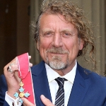 Achievement  Robert Plant displays his CBE which he received from Prince Charles. of Robert Plant