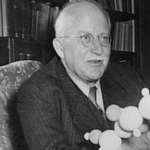 Achievement Hermann Staudinger with polymer molecule model of Hermann Staudinger