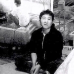 Achievement Tetsuya Ishida surrounded by his artworks. of Tetsuya Ishida