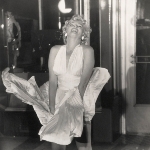 Achievement The iconic image of Marilyn Monroe in a flying up white dress made by Winogrand when the actress was at the set of the movie The Seven Year Itch in 1955. of Garry Winogrand