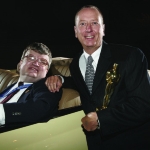 Achievement Barry Morrow holding Academy Award statuette with Kim Peek, who directly inspired Dustin Hoffman’s role in the Oscar-winning film Rain Man. of Barry Morrow