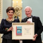 Achievement Teresa Toten holding the Governor-General’s Literary Award for Children’s literature that she received from Governor-General David Johnston (right) during a ceremony at Rideau Hall. of Teresa Toten