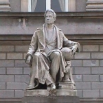 Achievement Statue of Adolphe Quetelet in the gardens of the Palais des Académies in Brussels. It shows him holding a globe in his left hand to reflect his international interests and the worldwide impact of his studies. of Lambert Quetelet