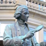 Achievement Statue of Joseph Priestley in City Square in Leeds, showing him focussing sunlight onto mercuric oxide. of Joseph Priestley