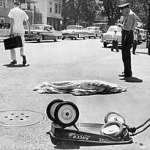 Achievement "Wheels of Death", Seaman's Pulitzer Prize-winning photograph of William Seaman