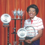 Achievement Althea Gibson, portrayed with her trophies at her home in East Orange, New Jersey. Photo by Yvonne Hemsey. of Althea Gibson