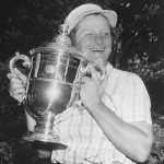 Achievement Babe Didrikson Zaharias grins and hugs the cup she received after becoming the first three-time winner of the U.S. Women's Open Golf Championship with a 72-hole 291. of Babe Zaharias