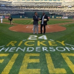 Achievement Rickey Henderson (left) and Dave Stewart (right) stands together after Henderson threw out the ceremonial first pitch prior to the start of the opening night game between the Los Angeles Angels of Anaheim and Oakland Athletics at the Oakland-Alameda County Coliseum. Photo by Thearon W. Henderson. of Rickey Henderson