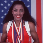 Achievement Olympian Florence Griffith Joyner during a photo shot displaying her three gold medals and one silver on April 26, 1988 that she received at the 1988 Seoul Olympics. of Florence Joyner