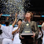 Achievement Pat Summitt of the Tennessee Volunteers holds the championship trophy after winning the SEC Women's Basketball Tournament Championship game at Bridgestone Arena on March 4, 2012 in Nashville, Tennessee. of Pat Summitt