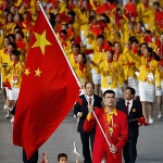 Achievement Yao Ming of the China Olympic men's basketball team carries his country's flag to lead out the delegation accompanied by Lin Hao, a 9-year-old survivor of the Schenau earthquake, during the Opening Ceremony for the Beijing Summer Olympics at the National Stadium, China. Photo by Cameron Spencer. of Yao Ming (Ming Yao)
