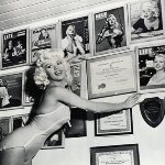 Achievement Jayne Mansfield, a Hollywood screen siren, is shown here surrounded by magazines covers which bare her image. of Jayne Mansfield