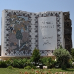 Achievement Khamsa Monumental Compound in Ganja. 
5 large book-shaped monuments recalling Nizami’s poems in the park line along the highway between Ganja fortress gates and Nizami Ganjavi Mausoleum.
The photo and information was provided by NGIC.
 of Nizami Ganjavi