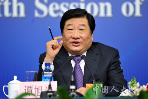 Xuguang Tan