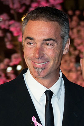 husband: Greg Wise