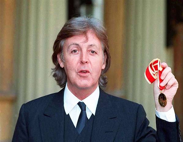 Knighted by Queen Elizabeth II for services to music