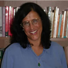 Wife: Rkia Elaroui Cornell