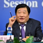 Xuguang Tan