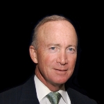 Mitch Daniels - friend and employer of Alan Anthony Reynolds